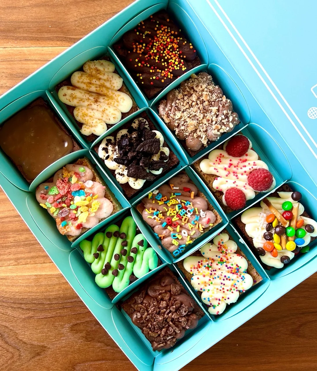 A twelve pack of assorted brownies and blondies